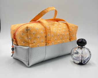 Orange quilted toiletry bag