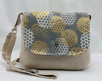 Shoulder bag with golden beige flap. Original minimalist and timeless