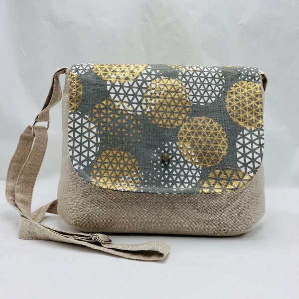 Shoulder bag with golden beige flap. Original minimalist and timeless