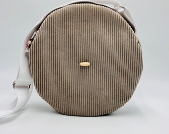 Round shoulder bag in timeless and UNIQUE taupe velvet