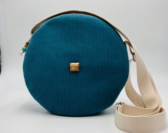 Original and UNIQUE round shoulder bag in blue green corduroy