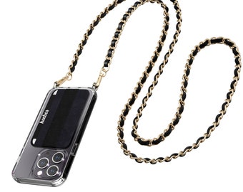 Puede incluir: Funda transparente para teléfono con correa de cadena negra y dorada. La funda tiene un agarre negro y el nombre de la marca "keebos" impreso. La cadena es de cuero negro tejido con eslabones de metal color oro.