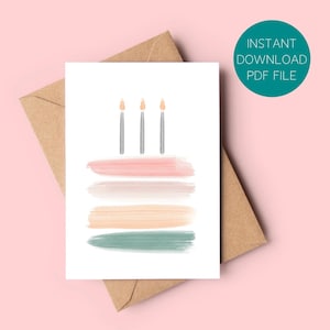 Pode incluir: Um conjunto de três canecas de cerâmica com acabamento fosco e salpicado. As canecas são em tons de creme, cinza claro e cinza escuro. Cada caneca tem um design simples e minimalista.