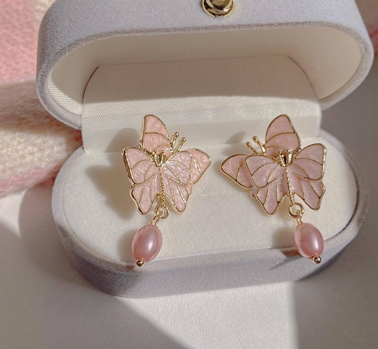 Butterfly pearl shop earrings