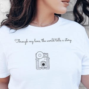 Through my lens the world tells a story tshirt, photographer tshirt, camera lover tshirt, photography, gift for photographer, vintage camera