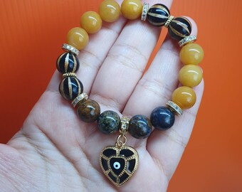 Handcrafted bracelet with Honey Onyx (10mm), African Pietersite and Tibetan Agate