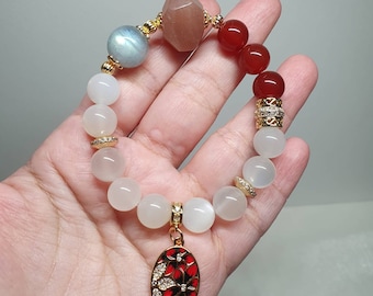 Handcrafted bracelet with Sunstone, Grey Moonstone,  Milky Moonstone and Carnelian