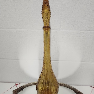 Light amber Empoli mid century wax drip genie bottle decanter with hobnail stopper