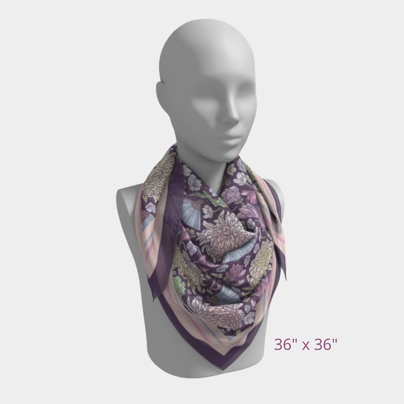 May include: A square scarf, 36 x 36 inches, featuring a floral pattern in shades of purple, pink, and green. The scarf is displayed on a mannequin. The design includes large chrysanthemum-like flowers and other botanical elements.