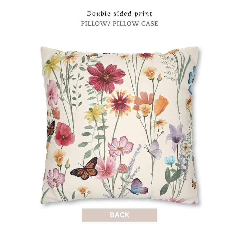 May include: Double-sided pillow case with a floral print featuring pink, red, yellow, and orange flowers with butterflies on a cream background. The back of the pillow case is the same print.