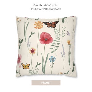 May include: Double-sided pillowcase featuring a watercolor floral pattern with butterflies. The front side shows a white background with red poppies, yellow flowers, blue flowers, green leaves, and orange butterflies.