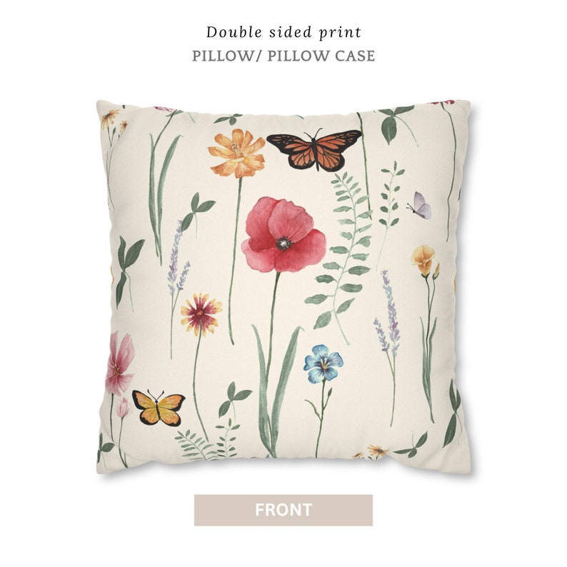 May include: Double-sided pillowcase featuring a watercolor floral pattern with butterflies. The front side shows a white background with red poppies, yellow flowers, blue flowers, green leaves, and orange butterflies.