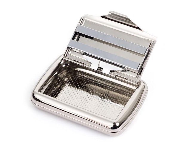 tobacco tin with paper holder Tobacco tin with paper holder