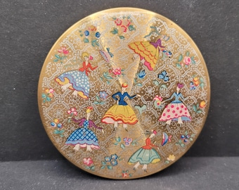 Polvos compactos vintage Zenette, damas victorianas bailando, encaje floral.