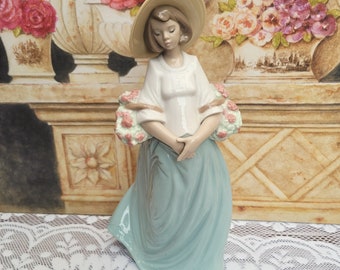 Nao by Lladro Figurine "Flower Harvest" 1356, Lady in hat carrying baskets of beautiful flowers