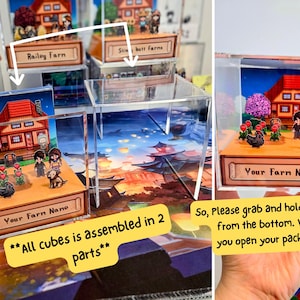 May include: A clear acrylic cube with a miniature farm scene inside. The scene features a small house, trees, flowers, and two figures. The cube is labeled "Your Farm Name" and is part of a set of cubes that are assembled in two parts.