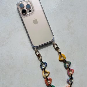 Coque téléphone transparente + dragonne triangle colorée – Accessoire téléphone tendance en résine ABS – Chaîne multicolore Y2K