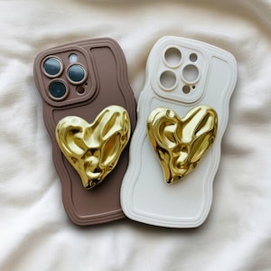 Hoesje en zijn steun - hoesje met golvende rand - telefoonhoesje - iPhone hoesje - hart - goud