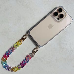 Coque téléphone transparente avec dragonne effet chaîne multicolore – Résine brillante – Accessoire tendance Y2K