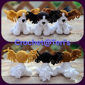 May include: Three handmade crochet dog figurines with long, textured ears. The left dog is white and gold, the center is white and black, and the right is white and brown. Each has a white body and a small black nose. The text Crochet@Teri's is visible.