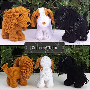 May include: Three crocheted dog toys. The first is a brown and white cocker spaniel, the second is a white and brown puppy, and the third is a black schnauzer. Crochet@Teri's.
