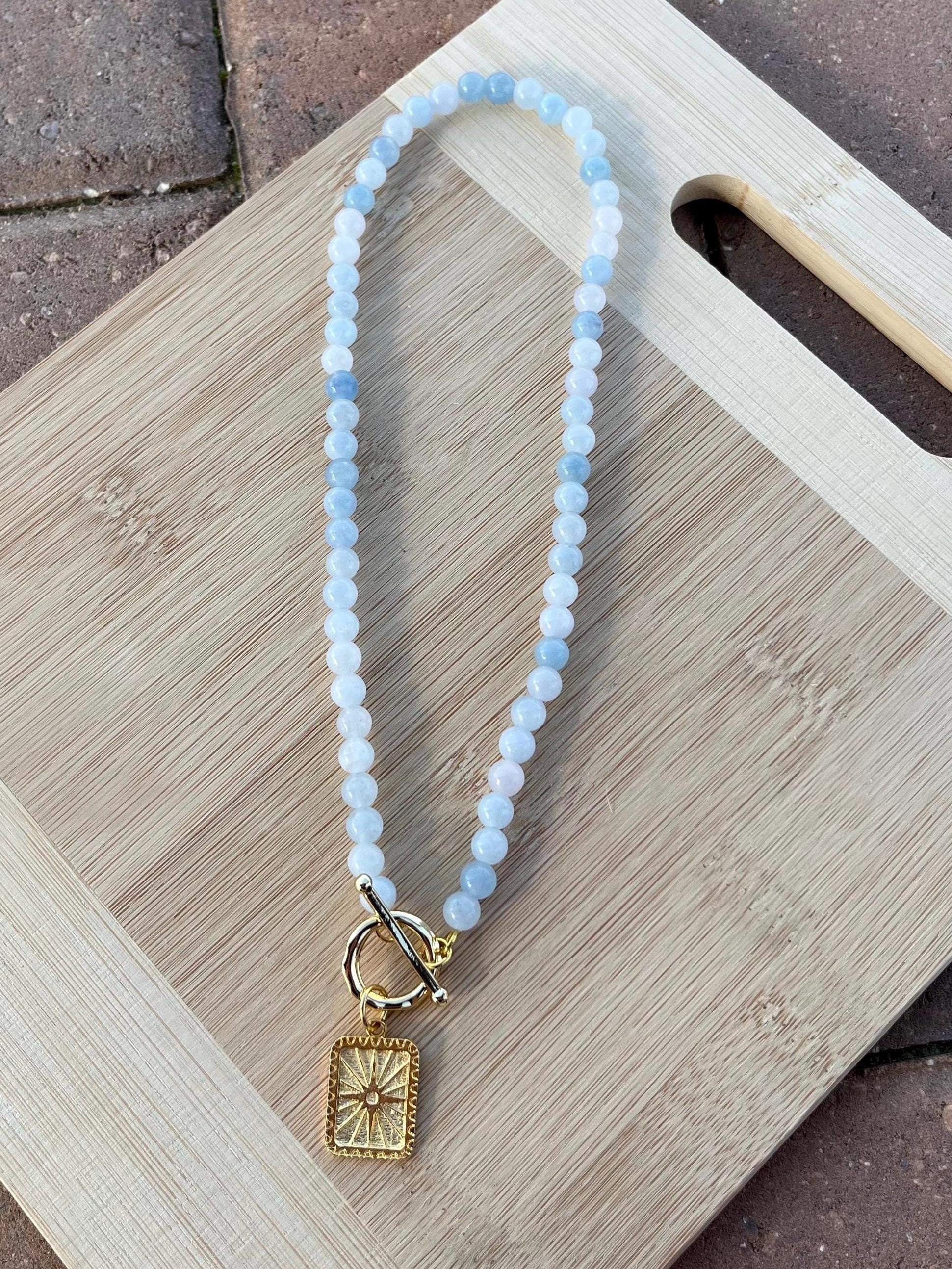 Aquamarine Beaded Necklace with Sunburst Charm