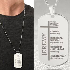 May include: Silver dog tag necklace with the name "JEREMY" engraved on it. The tag also includes a cross and inspirational quotes about being chosen, made for a purpose, a precious child of God, and loved forever.