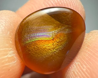 beautiful fire agate of the best AAA quality.measures 13.23x11.50x4.09mm weight 4.5 ct