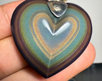 beautiful rainbow obsidian heart in 925 silver of excellent quality. Dimensions: 35.x34.39x11.2 mm.