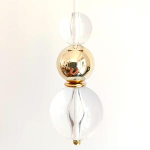 Transparent and Gold round bead light pull with cord