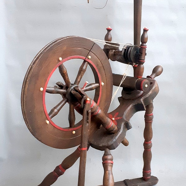 Antique unique Spinning Wheel with violin shape base