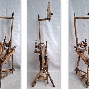 Antique Spinning Wheels very havy sturdy stable works great is complete / 1900