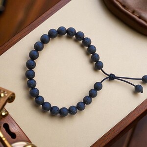 interactive bracelet
lava stone bracelet
rosary bracelet
worry beads bracelet
greek worry beads
anxiety bracelet
meditation bracelet
stress relief gift
stimming bracelet
komboloi armband
mens fidget bracelet
beaded fidget toy
EDC calming bracelet