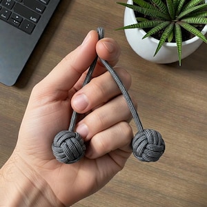 Dubbel Apa Nävknutar – Begleri Toggles Fidgetleksak för Vuxna - Kärna i Rostfritt Stål