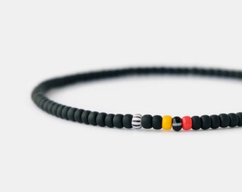 Matte Black Beaded Bracelet for Men: Multicolor Accent Beads