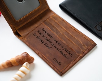 May include: A brown leather wallet with a personalized inscription that reads "Any man can be a father, But it takes a real badass to be my Dad. Linda".
