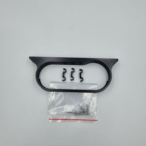 May include: Black plastic frame with three metal clips and a bag of screws.