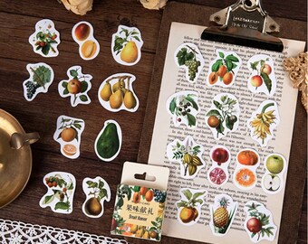 May include: A sheet of colorful stickers featuring various fruits and vegetables. The stickers are on a white background and have a vintage aesthetic. The stickers are arranged in a grid pattern. The stickers are perfect for adding a touch of whimsy to your planner, journal, or scrapbook.