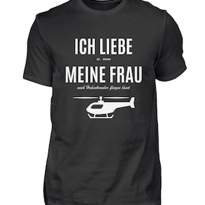 May include: A set of three ceramic mugs with a speckled, matte finish in cream, light grey, and dark grey. Each mug has a simple, minimalist design, ideal for coffee or tea.