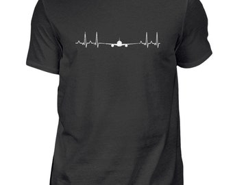 May include: Black t-shirt with a white airplane graphic and a heartbeat line.