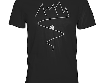 May include: A black t-shirt with a white graphic design of a winding road leading up a mountain range with a small car driving on the road.