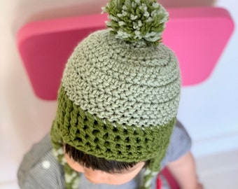 Nordic wool beanies with earflaps, pom pom and tassels for forest children, green, size 1-3 years old