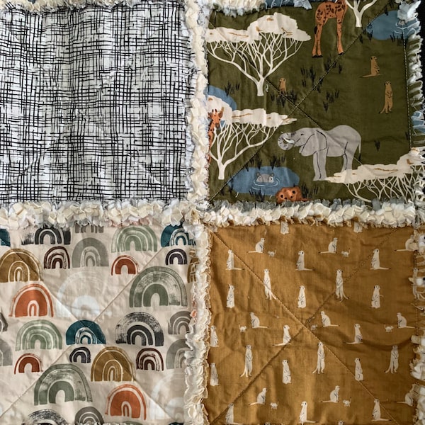 Throw Size Watering Hole Theme with Lions, Elephants, Meerkats, and Giraffes Rustic Rag Quilt