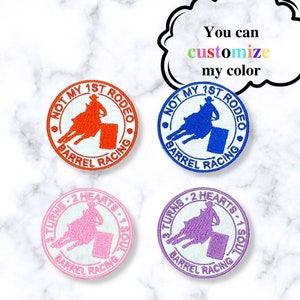 May include: Four embroidered iron-on patches featuring a horse and barrel racer with the text "Not My 1st Rodeo Barrel Racing" and "3 Turns 2 Hearts 1 Soul Barrel Racing". The patches are in red, blue, pink, and purple.
