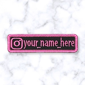 May include: Black and pink embroidered patch with an Instagram logo and the text "your_name_here".