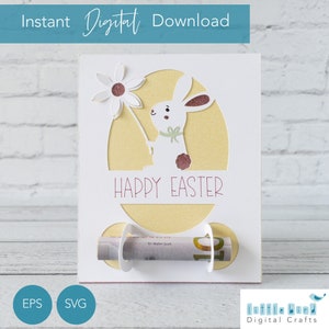 Joyeuses Pâques avec porte-monnaie SVG avec lapin tenant une fleur à utiliser avec les stylos Cricut et le dorure. Modèle de boîte-cadeau gratuit inclus