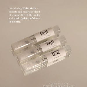 May include: Three clear 3ml spray perfume vials labelled White Musk Eau de Parfum. The text reads: Introducing White Musk, a delicate and luxurious blend of jasmine, lily-of-the-valley and musk. Quiet confidence in a bottle. Sample size 3ml included in discovery set.