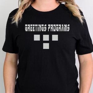 Greetings Programs Tron shirt: Flynn Video Arcade Gamer, Magic Kingdom theme park t-shirt, Ares Legacy Tee