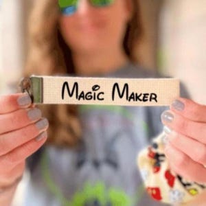 Magic Maker Keychain Wristlet: Disney Travel Agent lanyard bracelet, canvas keychain, black key ring, and cast member gift