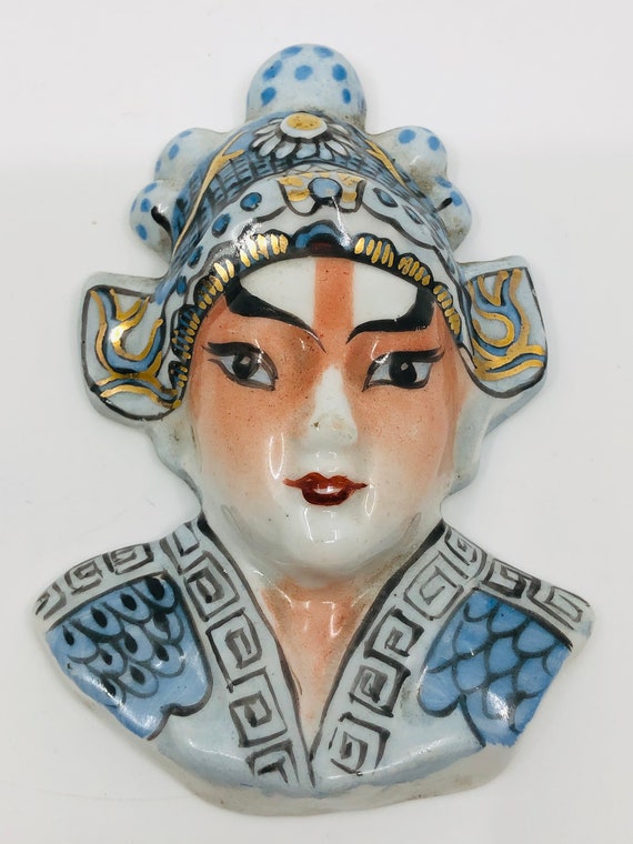 Hand carved face - image 1